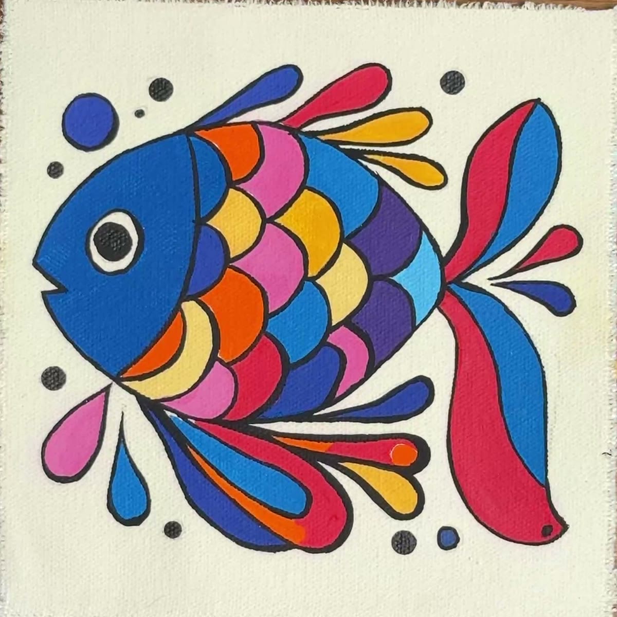 Navy folk fish with rainbow scales and a red tail on cream